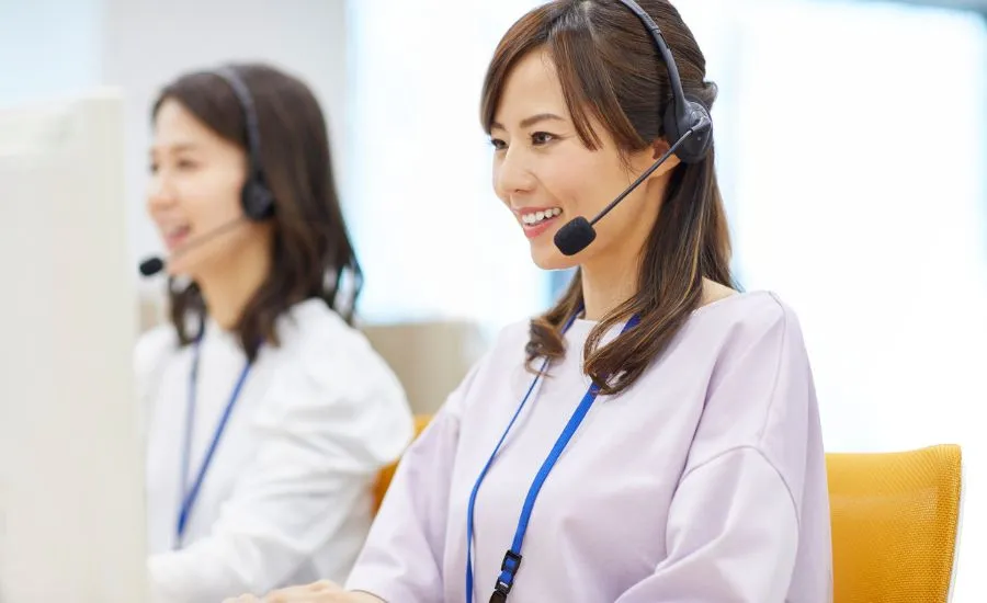 A customer support agent assisting someone over the phone