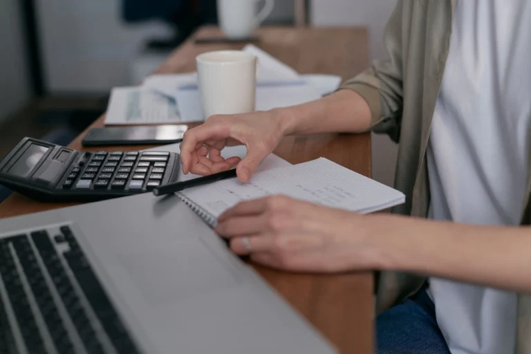 Dental office administrative team reviewing patient billing records and claim status