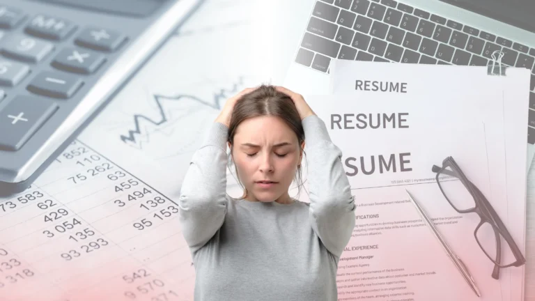 A stressed professional looking overwhelmed by resumes and job applications, highlighting why traditional public listings fail in accounting executive search.